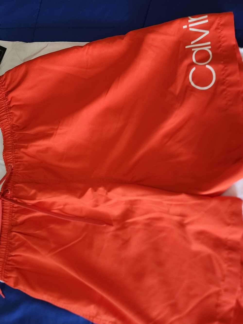 Calvin Klein Red-Orange Swim Shorts with Logo